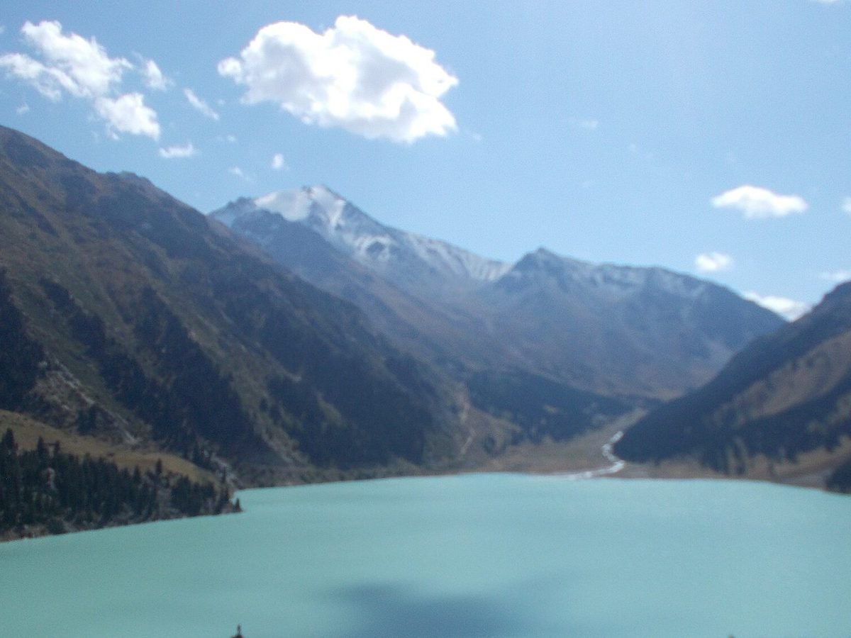 Big Almaty Lake, turquoise below the snow-covered mountains of Kazakhstan